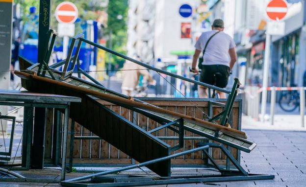 Broken furniture in street after violence in Stuttgart, 21 Jun 20