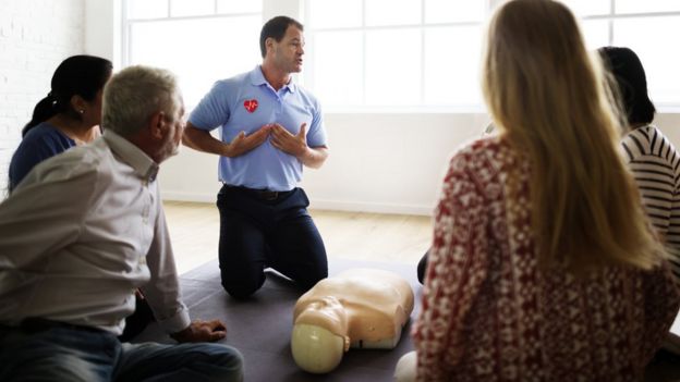 A group receiving CPR training