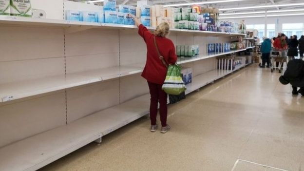 Shopper looking for toilet roll