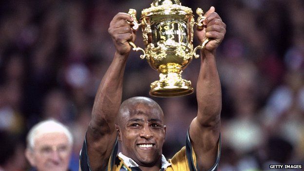 George Gregan lifting the Web Ellis Trophy after Australian won the 1999 Rugby World Cup