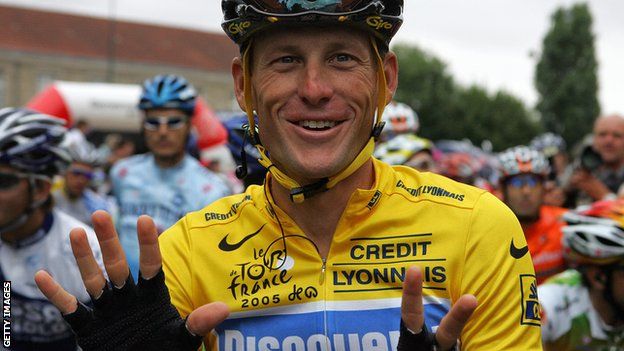 Lance Armstrong holds up seven fingers while wearing the yellow jersey in 2005 to signify the seven Tour de France titles he was later stripped of