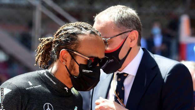 F1 Chairman Stefano Domenicali talks to Lewis Hamilton at the Monaco Grand Prix