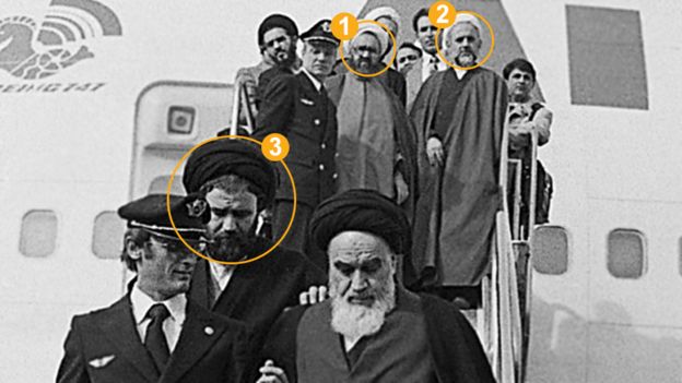 Ayatollah Khomeini and close companions getting off a plane