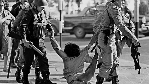 Worker being arrested during a protest against Argentine dictatorship in Buenos Aires. 30 March 1982