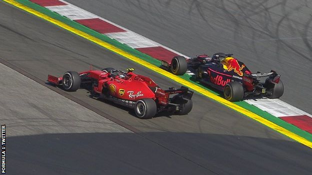 Charles Leclerc and Max Verstappen race side by side