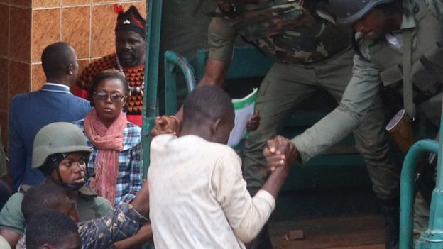 The freed students being helped into a truck by paramilitary force in Bamenda