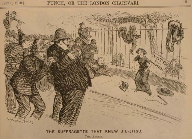 Punch cartoon: "The suffragette that knew Jiu-Jitsu" - policemen cower in front of suffragette