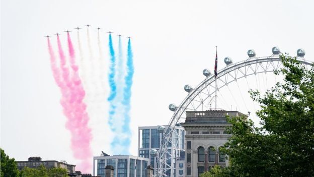 The Red Arrows left their trademark red, white and blue trails as they soared over London