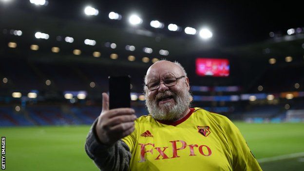 A Watford fan at Turf Moor after their game with Burnley was postponed