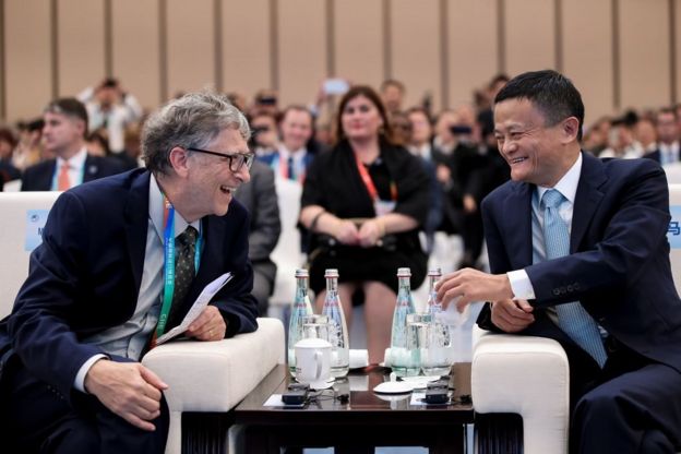 Microsoft founder Bill Gates (L) talks with Alibaba Chairman Jack Ma (R) bfore duirng the Hongqiao International Economic and Trade Forum in the China International Import Expo at the National Exhibition and Convention Centre on November 5, 2018 in Shanghai, China. The first China International Import Expo will be held on November 5-10 in Shanghai. (Photo by Lintao Zhang/Getty Images) Import Expo Paraallel Session on Trade Innovation