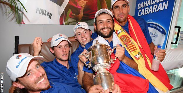 Tommy Fleetwood, Thomas Pieters, Matthew Fitzpatrick, Alexander Levy and Rafa Cabrera-Bello of Europe celebrate with the trophy during the singles matches on day three of the 2018 EurAsia Cup