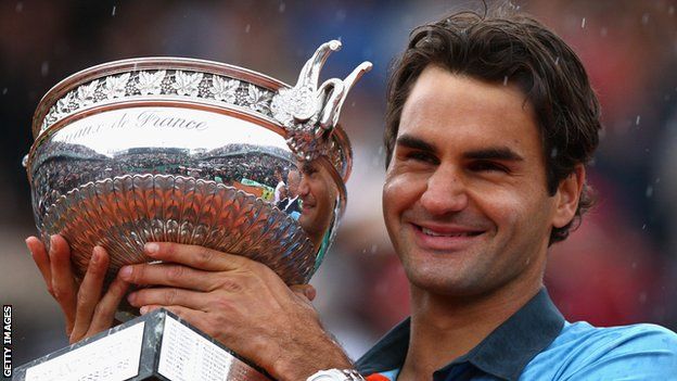Roger Federer with the French Open trophy