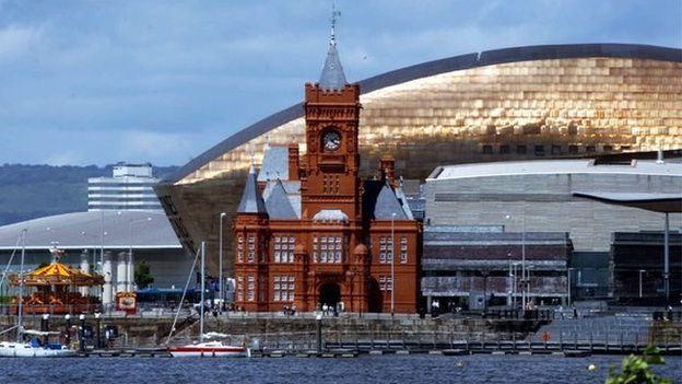 The old and the new: The Pierhead building in front of Cardiff's Wales Millennium Centre in today's Cardiff Bay