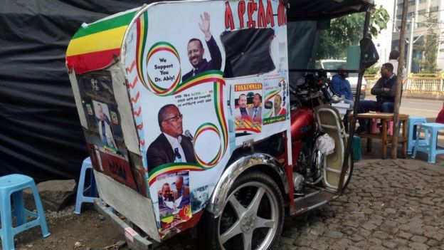 Posters of Ethiopian Prime Minister Abiy Ahmed are seen on a tuc-tuc in Addis Ababa, Ethiopia on November 07, 2018