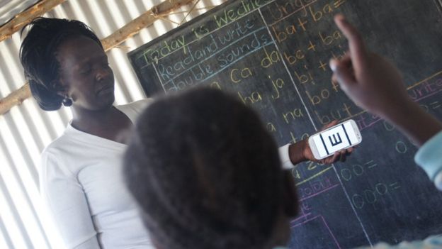 picture of children and teachers using the app