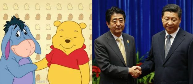 Winnie the Pooh juxtaposed next to President Xi Jinping and PM Shinzo Abe