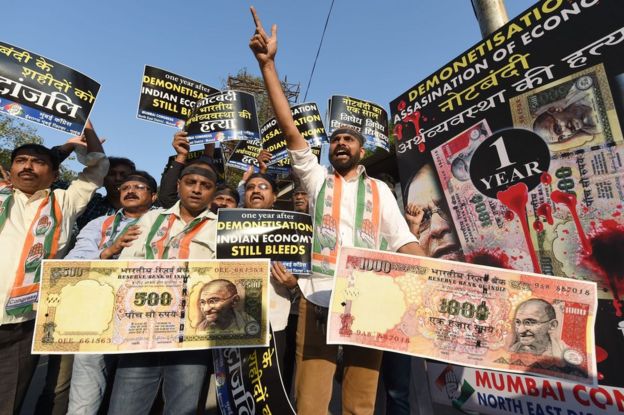 Indian Congress party supporters protest on the eve of the first anniversary of India's currency ban scheme in Mumbai