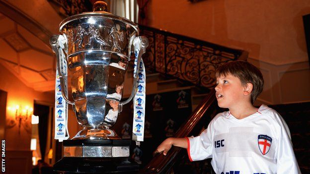 Young fan looks at the Rugby League World Cup