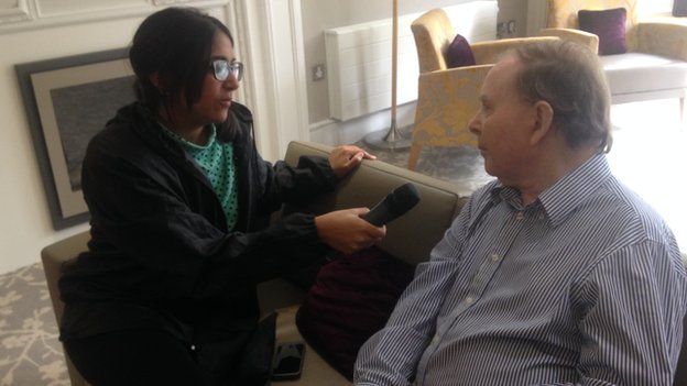 Sima Kotecha talks with 80-year-old Jonathan Ryan