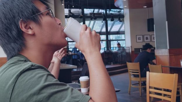 Tom Chan drinking from a TrioCup