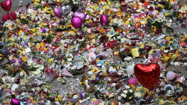 Manchester attack: Flowers to be removed as memorial planned - BBC News