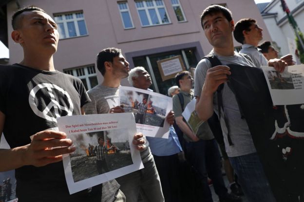 Afghans protest against deportations outside the Afghan embassy in Berlin, 31 May