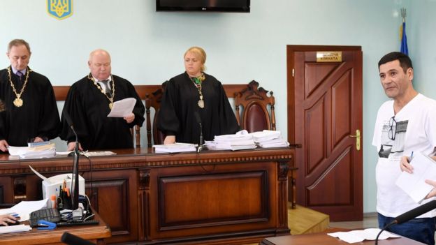 Gilbert Chikli listens to the verdict of the Court of Appeal, on September 26, 2017 in Kiev AFP 