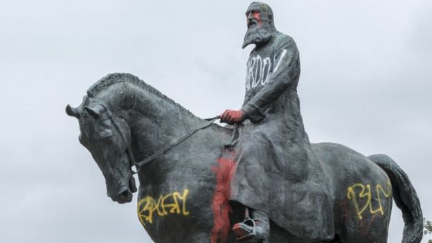 A vandalised statue of King Leopold II in Brussels