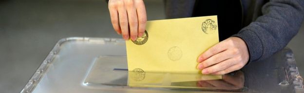 A man casts his ballot at a polling station during a referendum Aegean port city of Izmir,