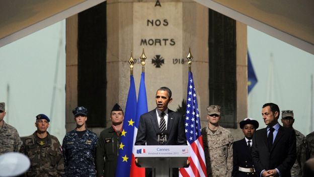 US President Barack Obama (L) talks next to his French counterpart Nicolas Sarkozy during a ceremony at a World War I memorial in Cannes on November 4, 2011 at the end of the G20 Summit for Heads of State and Government