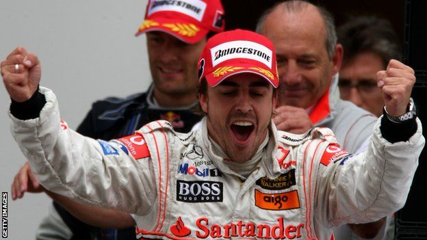 Fernando Alonso of Spain and McLaren Mercedes celebrates on the podium after winning the European Grand Prix at Nurburgring on July 22, 2007