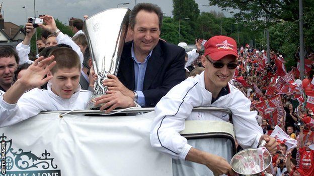 Gerard Houllier celebrates Liverpool's cup treble in 2001 on an open-top bus parade with Steven Gerrard and Sami Hyypia