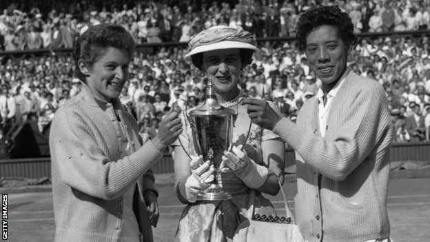 Angela Buxton and Althea Gibson with the Wimbledon doubles trophy