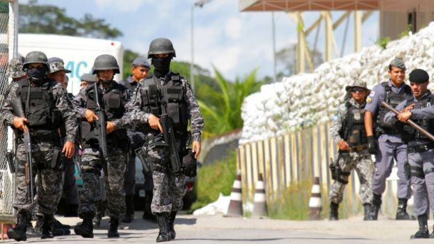Police officers are seen during a riot in a prison in Brazilian state of Amazonas in Manaus, 27 May 2019