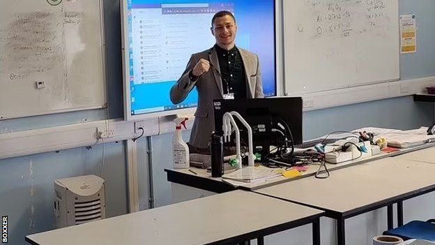 Zak Chelli in a classroom as a supply teacher