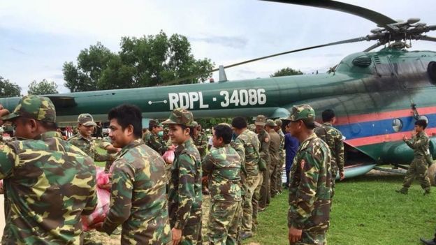 Laotian soldiers prepare for rescue efforts after the Xe Pian Xe Nam Noy dam collapsed in a village near Attapeu province on 24 July 2018