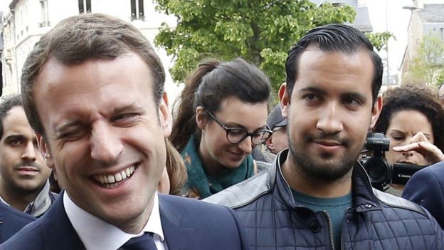 The then French presidential candidate Emmanuel Macron (C) of the 'En Marche' political movement flanked by security staff Alexandre Benalla (R) during an election campaign visit in Rodez, France, 05 May 2017