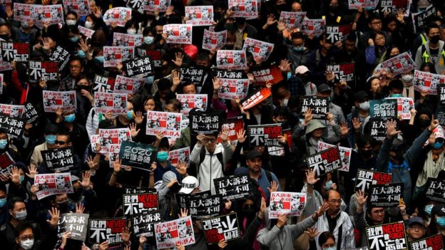 Anti-government protesters attend a demonstration on New Year"s Day to call for better governance and democratic reforms in Hong Kong, China, January 1, 2020.