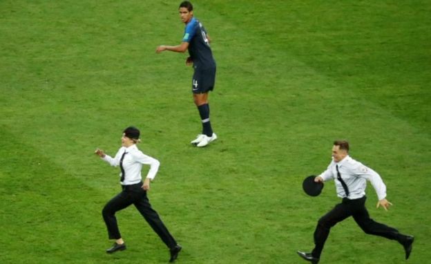 Pitch invasion at World Cup, 15 Jul 18