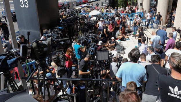 Members of the media gather outside the courthouse where Real Madrid's Portuguese star Cristiano Ronaldo was testifying on charges of tax fraud in Pozuelo de Alarcon, outside Madrid, Spain, 31 July 2017