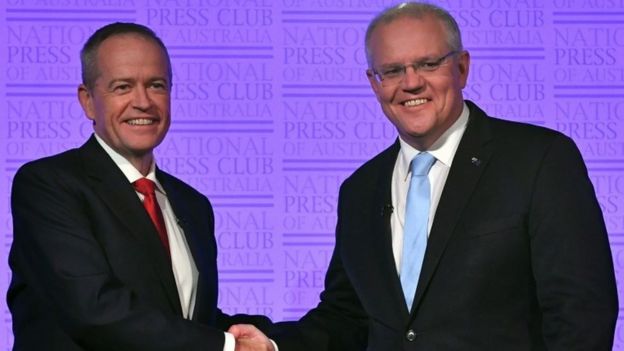 Scott Morrison and Bill Shorten shake hands during a debate