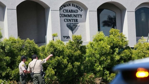 San Diego Sheriff deputies look over the Chabad of Poway Synagogue after a shooting on Saturday, April 27, 2019 in Poway, California