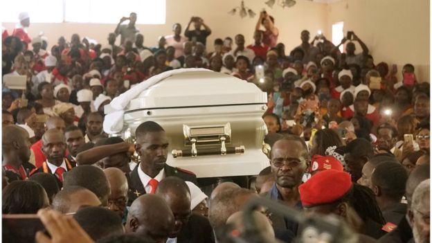 The casket of late opposition leader Morgan Tsvangirai is carried into Mabelreign Methodist Church in Harare for a memorial service on February 18, 2018.