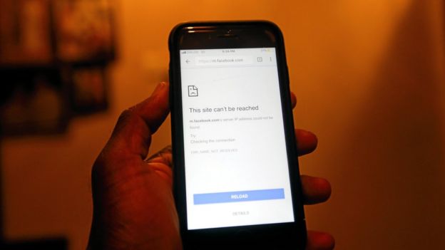 A mobile phone screen shows a Facebook page unable to open after the government shut down social messaging networks including Facebook island wide in Colombo, Sri Lanka on 7 March 2018