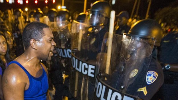 Protesters square off against the police in the city of Baton Rouge in 2016