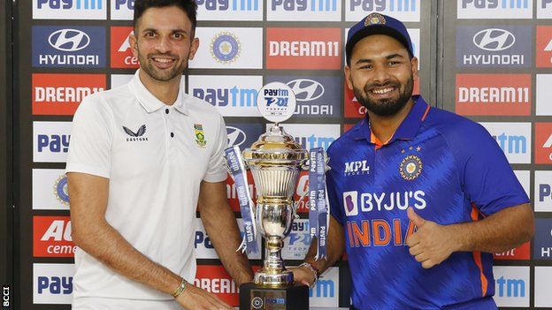 South Africa captain Keshav Maharaj and India skipper Rishabh Pant with the T20 series trophy