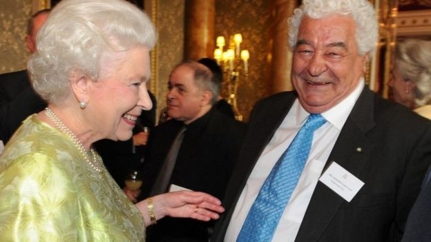 Queen Elizabeth II speaking with celebrity chef and restaurateur Antonio Carluccio