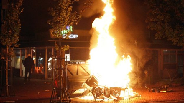 Chairs burn in the northern Dutch town of Haren late on September 21, 2012