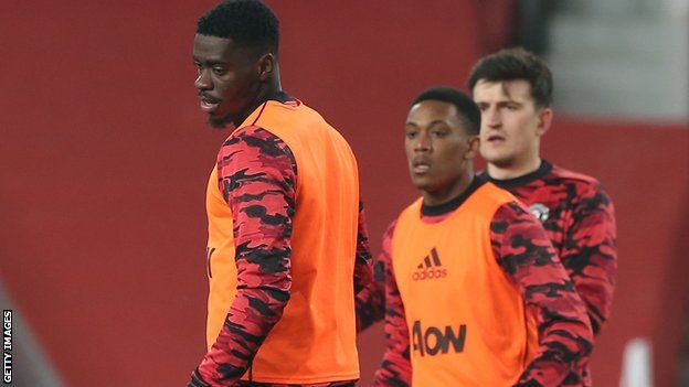 Manchester United players Axel Tuanzebe and Anthony Martial