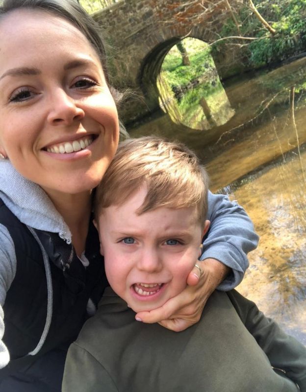 beth pattison and her son, finn lynch, pictured by a river